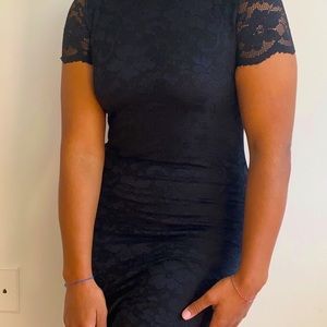 Body con lace black dress with turtle neck